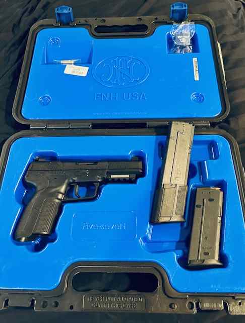 LNIB FN 5.7 Pistol one 30rd mag 500 rds. ammo